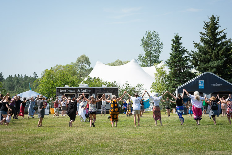 Everyone joins in for a round dance following Friday morning&rsquo;s traditional welcoming ceremony led by elder Sherry Copenace.