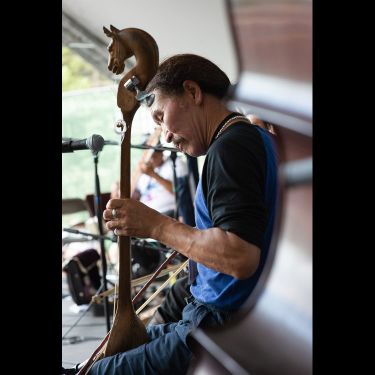 From the other side of the world, Huun-Huur-Tu showcases traditional Tuvan instruments and throat singing. Check out this video I recorded of them performing Aa shuu Dekei oo with Genticorum and Gaelynn Lea
