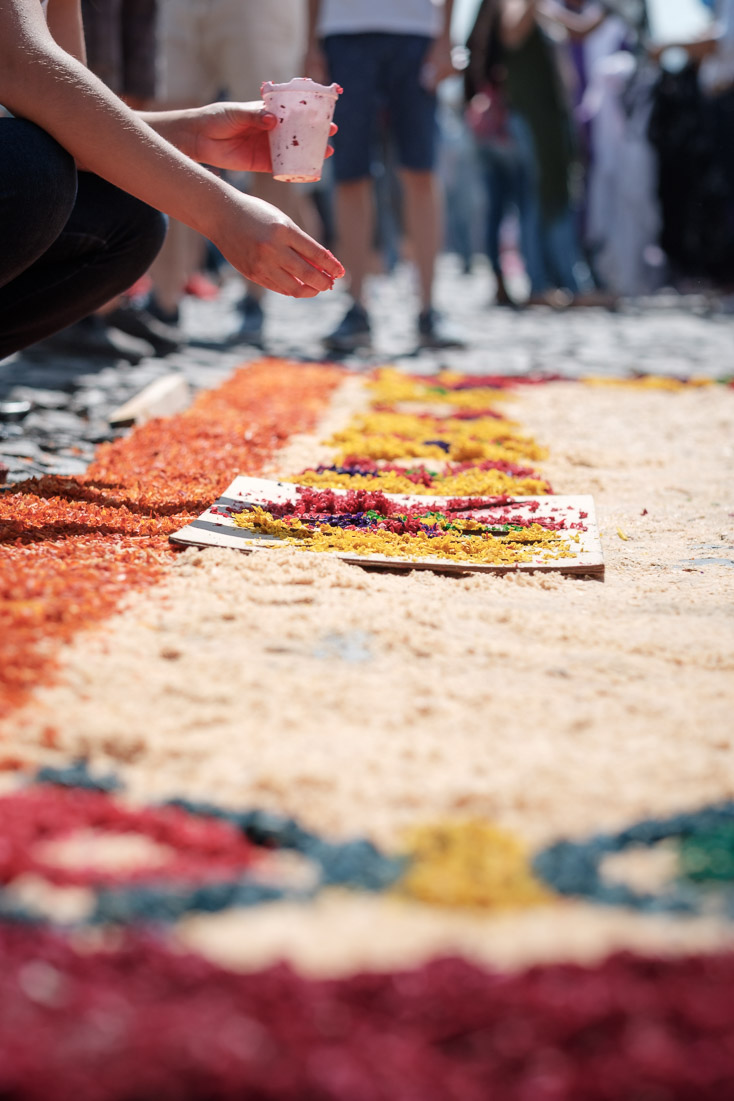 Fingers are stained with dye through the creative work at hand.