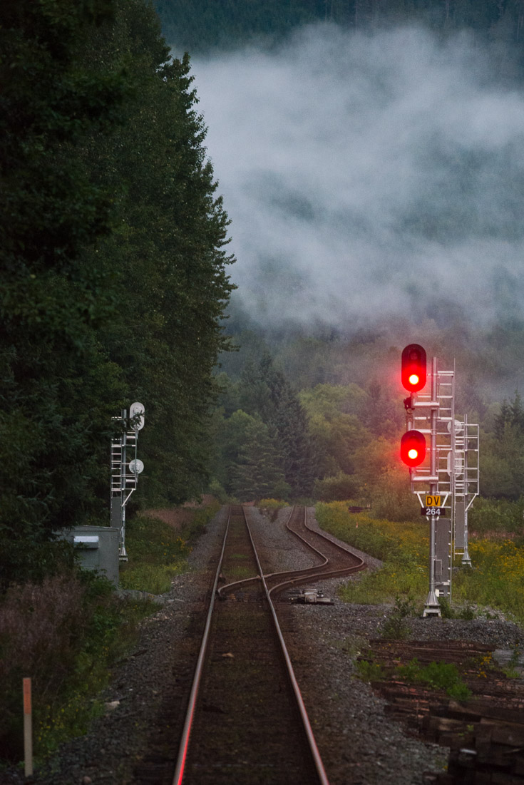 Nearing the coast, the mist of the temperate rainforest rose up over the train tracks as the sun set. At sunrise I would be boarding a ferry to cross the Hecate Straight to begin the next leg of my journey on the Haida Gwaii.