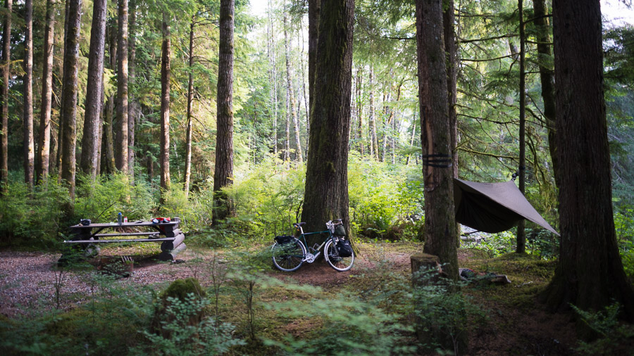 Another beautiful, rustic campground set up by a logging company was discovered through some more word of mouth. This day was a shorter ride than that previous because the mountain passes the road crossed over were wearing me down and the next camp was a long ways ahead for those of us relying on pedal power.