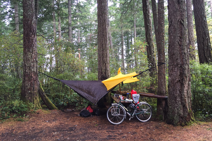 The storm ended up living up to its hype and broke records by dumping as much rain in 24 hours as this wet part of the world usually receives in an entire year. Grateful for high ground and my hammock-tent being off the forest floor itself, I sheltered beneath this small tarp and poncho for four full days.