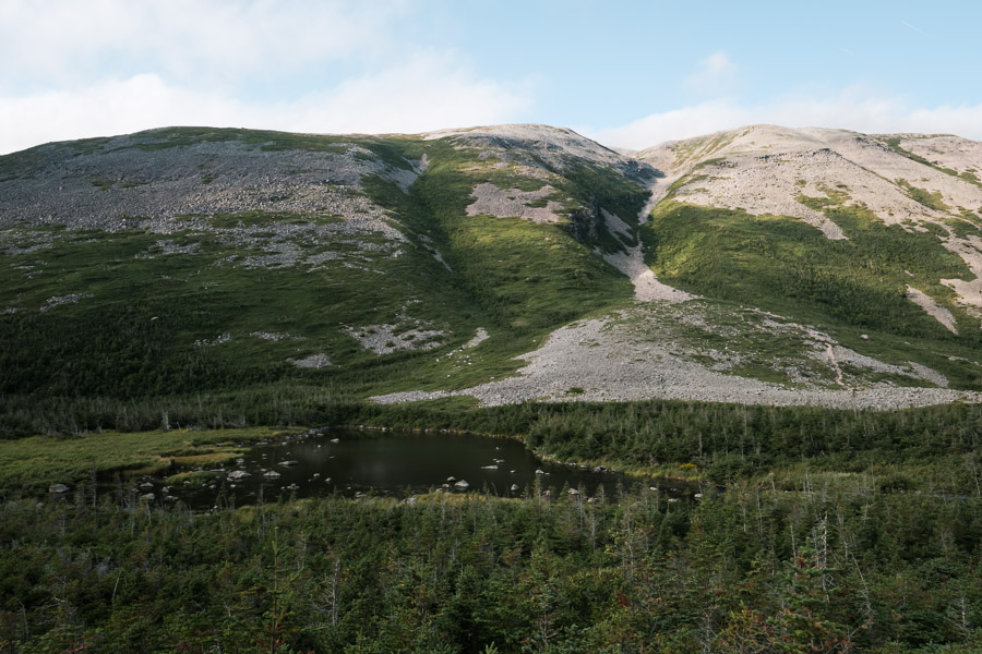 This is Gros Morne: a mountain that is the namesake for the national park it lies within and also the second tallest point in Newfoundland. &ldquo;Gros Morne&rdquo; is a French title that roughly translates to &ldquo;large mountain standing alone&rdquo; - an apt description for an old mountain that is very different from the familiar young peaks of western Canada&rsquo;s Rocky Mountains.