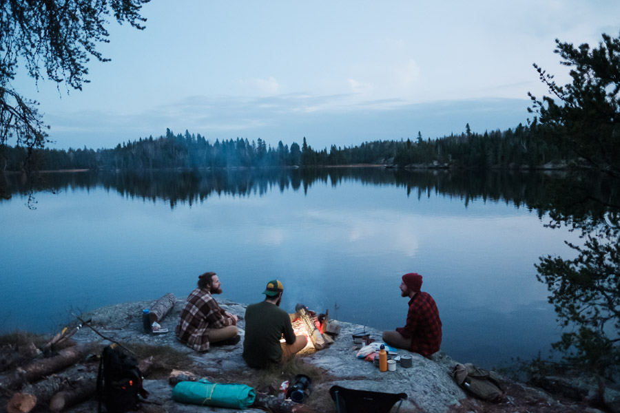 Watching the stars come out while gathered around the fire.