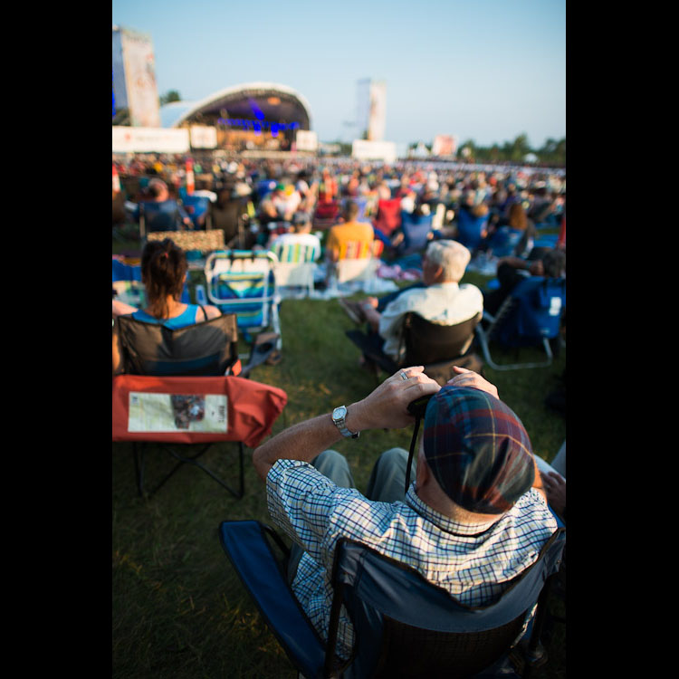 Ways to ensure a good view of Main Stage include utilizing the huge video screens, dancing your way up to the front, or, in this case, binoculars.