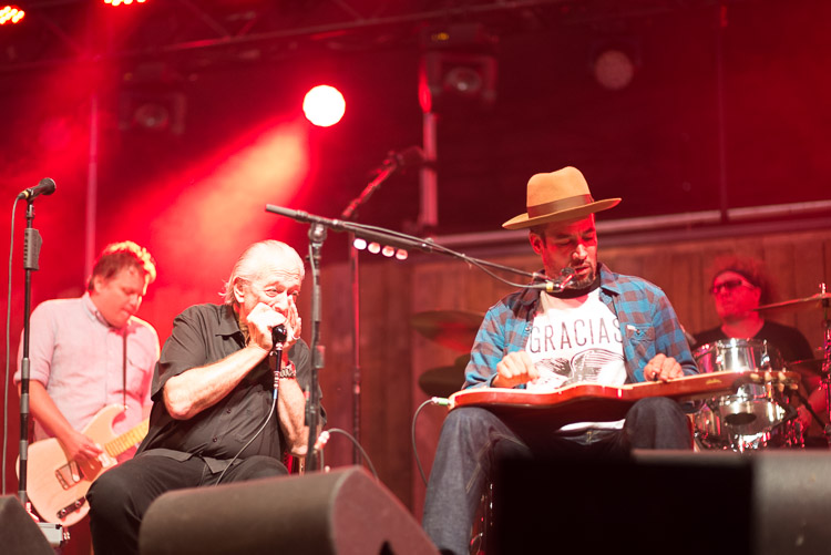 Charlie Musselwhite watches Ben Harper closely as they take turns leading the jam.