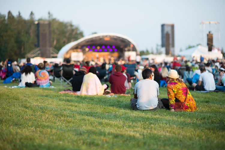 People gather at the main stage to hear the first chords that will kick off the festival. Lost in a field of friends, watching the sun set, and listening to amazing musicians do their thing&hellip;these are the festival moments I know and love.